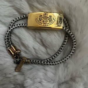 Juicy Couture black&white striped cable bracelet with gold charms and logo